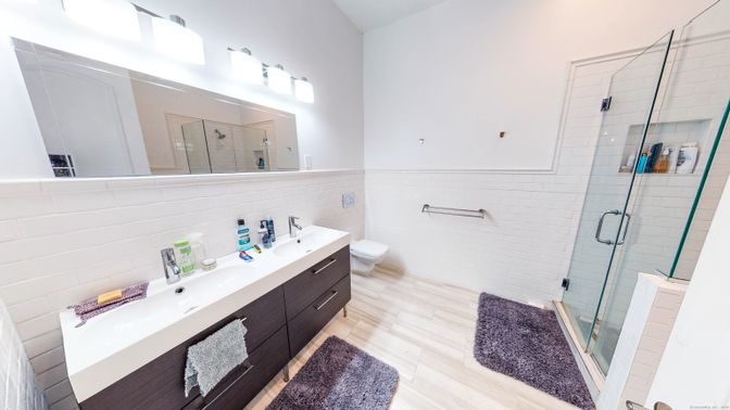 Bathroom, Dual Sink Vanities, Glass Shower, Interior, Wood Texture Flooring