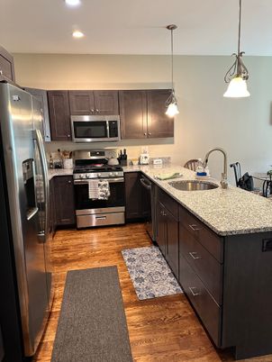Interior, Kitchen, Pendant Lights, Recessed Lighting, Stainless Steel Appliances, Wood Texture Flooring