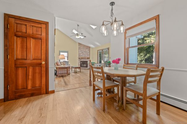 Dining room, Fireplace, Interior, Pendant Lights, Stone Walls, Wood Texture Flooring