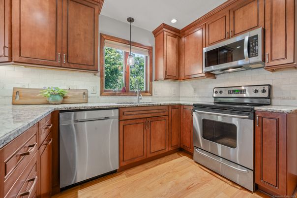 Interior, Kitchen, Pendant Lights, Recessed Lighting, Stainless Steel Appliances, Wood Texture Flooring