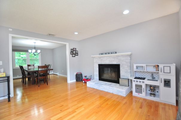 Chandelier, Dining room, Fireplace, Interior, Recessed Lighting, Wood Texture Flooring