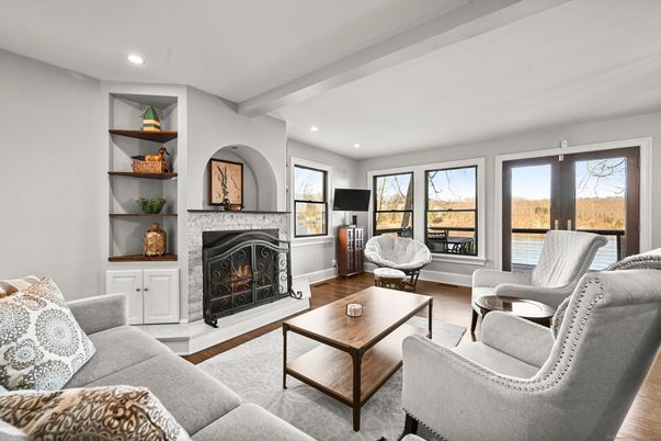 Fireplace, Interior, Living room, Recessed Lighting, Water, Wood Texture Flooring