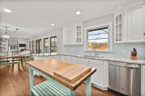 Dining room, Interior, Kitchen, Pendant Lights, Recessed Lighting, Stainless Steel Appliances, Wood Texture Flooring