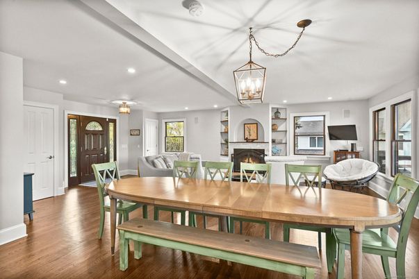 Dining room, Fireplace, Interior, Living room, Pendant Lights, Recessed Lighting, Wood Texture Flooring