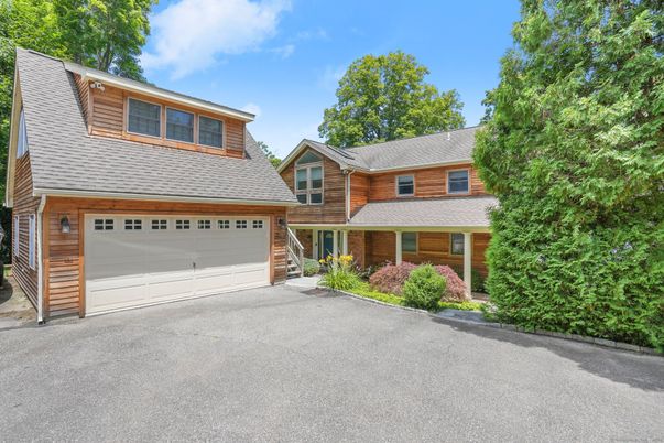 Attached, Exterior, Facade, Brick Facade, Log Home