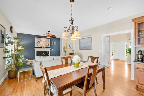 Chandelier, Dining room, Fireplace, Interior, Living room, Pendant Lights, Wood Texture Flooring