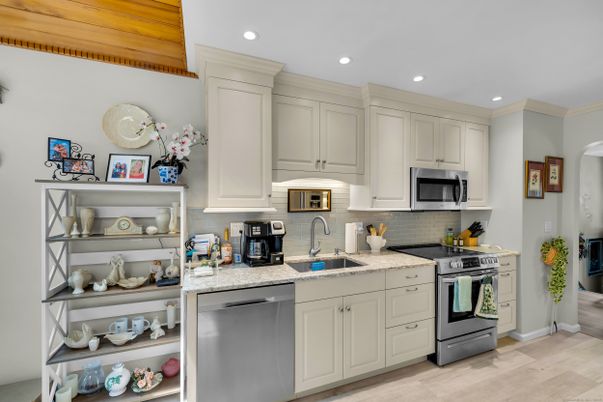 Interior, Kitchen, Recessed Lighting, Stainless Steel Appliances, Wood Texture Flooring