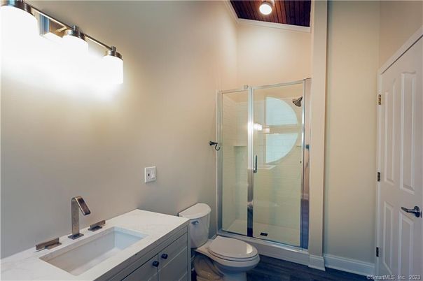 Bathroom, Glass Shower, Interior, Recessed Lighting, Wood Texture Flooring