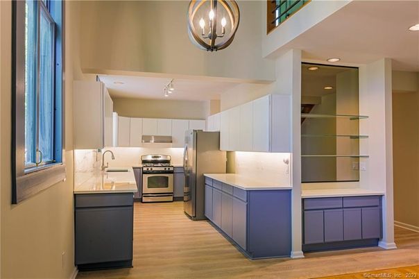 Interior, Kitchen, Pendant Lights, Recessed Lighting, Stainless Steel Appliances, Wood Texture Flooring