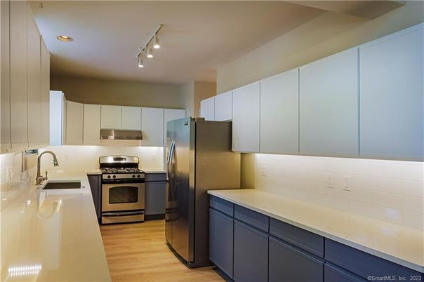 Interior, Kitchen, Recessed Lighting, Stainless Steel Appliances, Wood Texture Flooring