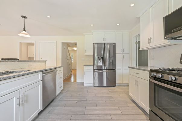 Interior, Kitchen, Pendant Lights, Recessed Lighting, Stainless Steel Appliances, Wood Texture Flooring