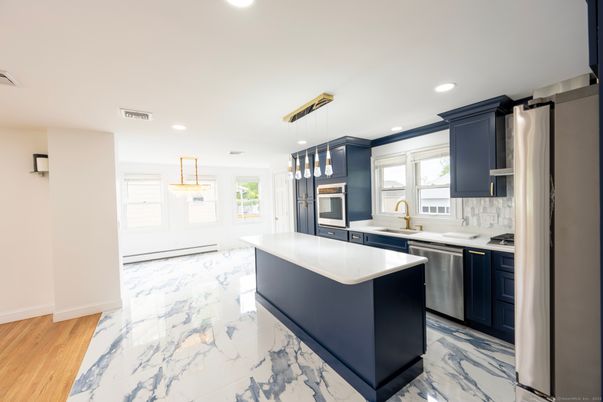 Interior, Kitchen, Marble, Pendant Lights, Recessed Lighting, Stainless Steel Appliances, Wood Texture Flooring