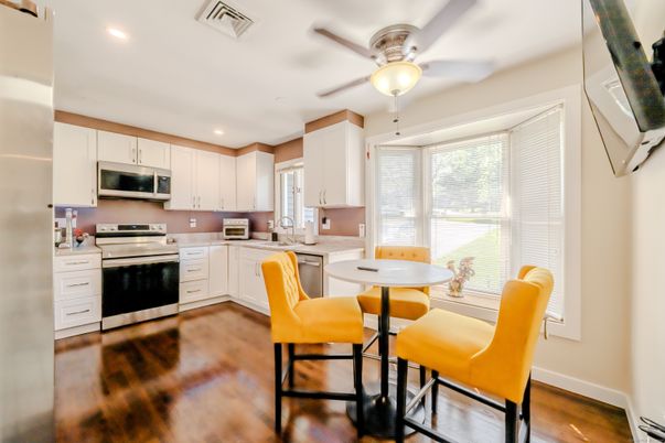 Dining room, Interior, Kitchen, Recessed Lighting, Stainless Steel Appliances, Wood Texture Flooring
