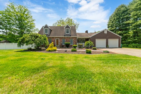 Attached, Backyard, Exterior, Facade, Brick Facade, Cape Cod