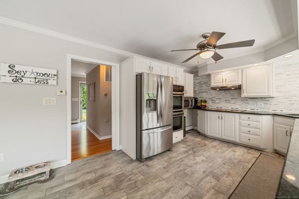 Interior, Kitchen, Recessed Lighting, Stainless Steel Appliances, Wood Texture Flooring
