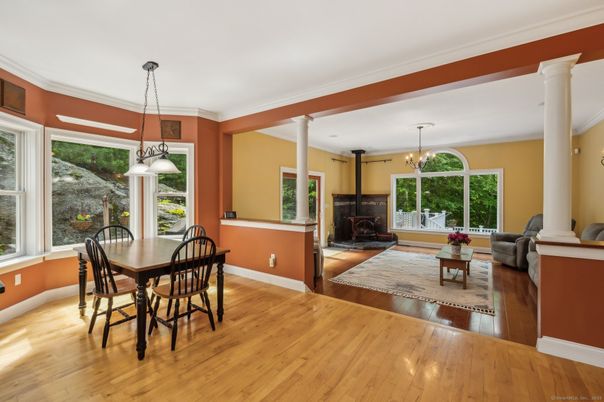 Chandelier, Dining room, Fireplace, Interior, Living room, Pendant Lights, Wood Texture Flooring
