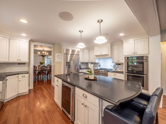 Chandelier, Dining room, Interior, Kitchen, Pendant Lights, Recessed Lighting, Stainless Steel Appliances, Wood Texture Flooring