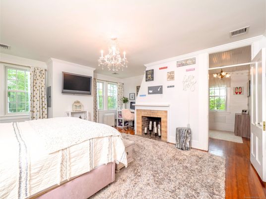 Bedroom, Chandelier, Fireplace, Interior, Wood Texture Flooring