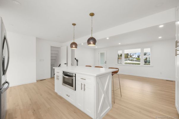 Interior, Kitchen, Pendant Lights, Recessed Lighting, Stainless Steel Appliances, Wood Texture Flooring