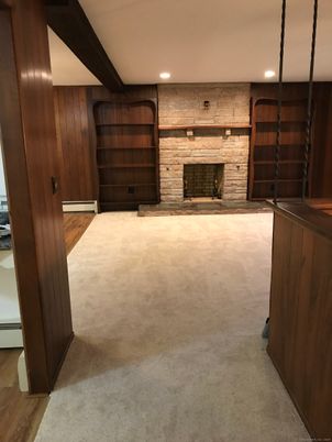 Empty room, Fireplace, Interior, Recessed Lighting, Stone Walls, Wood Texture Flooring, Wooden Walls