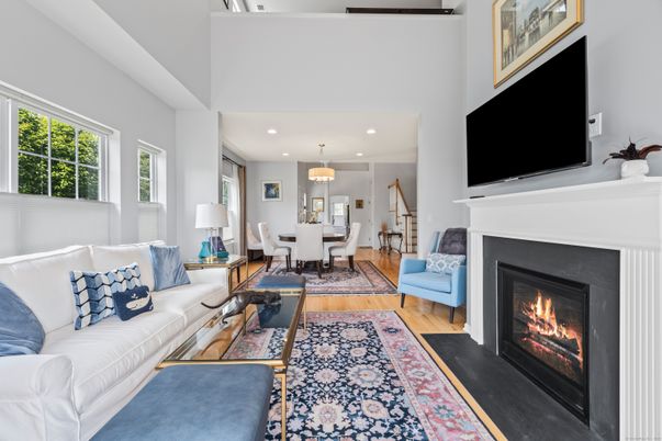 Dining room, Fireplace, Interior, Living room, Pendant Lights, Recessed Lighting, Wood Texture Flooring