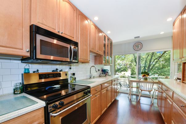 Dining room, Interior, Kitchen, Recessed Lighting, Stainless Steel Appliances, Wood Texture Flooring
