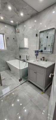Bathroom, Dual Sink Vanities, Glass Shower, Interior, Marble Walls, Recessed Lighting