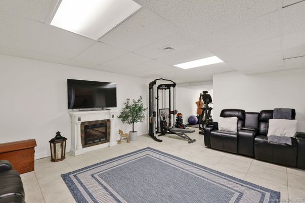 Fireplace, Fitness Equipment, Interior, Living room, Recessed Lighting