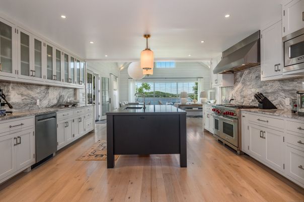 Interior, Kitchen, Marble Walls, Pendant Lights, Recessed Lighting, Stainless Steel Appliances, Wood Texture Flooring