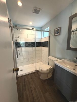 Bathroom, Glass Shower, Interior, Recessed Lighting, Wood Texture Flooring