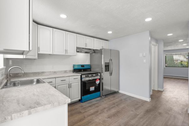Interior, Kitchen, Recessed Lighting, Stainless Steel Appliances, Wood Texture Flooring