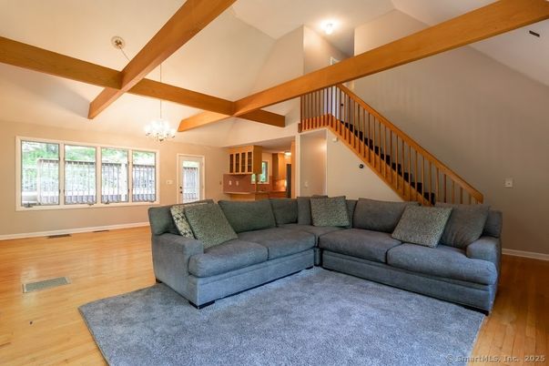Chandelier, Interior, Living room, Recessed Lighting, Wooden Beams, Wood Texture Flooring