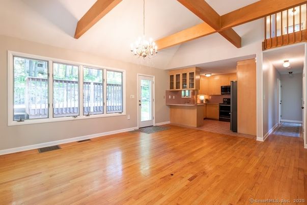 Chandelier, Empty room, Interior, Kitchen, Pendant Lights, Stainless Steel Appliances, Wooden Beams, Wood Texture Flooring