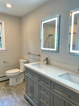 Bathroom, Dual Sink Vanities, Interior, Recessed Lighting, Wood Texture Flooring