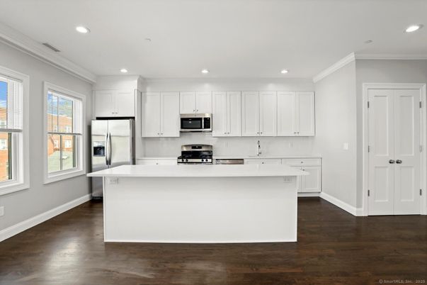 Interior, Kitchen, Recessed Lighting, Stainless Steel Appliances, Wood Texture Flooring
