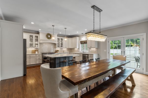 Chandelier, Dining room, Interior, Kitchen, Pendant Lights, Recessed Lighting, Stainless Steel Appliances, Wood Texture Flooring