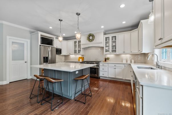 Interior, Kitchen, Pendant Lights, Recessed Lighting, Stainless Steel Appliances, Wood Texture Flooring