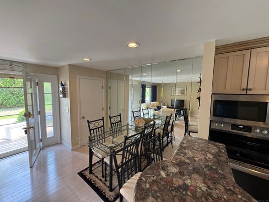 Dining room, Interior, Kitchen, Recessed Lighting, Stainless Steel Appliances, Wood Texture Flooring