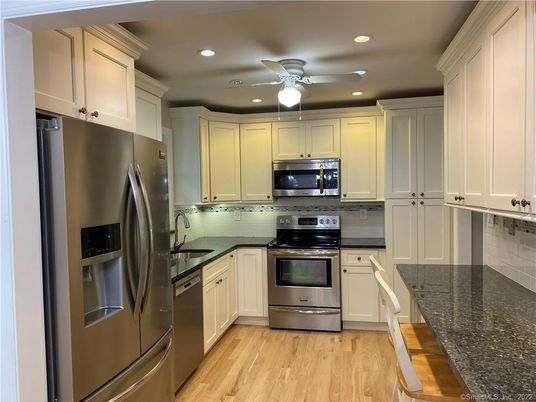 Interior, Kitchen, Recessed Lighting, Stainless Steel Appliances, Wood Texture Flooring