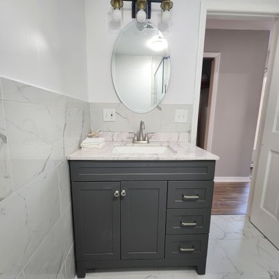 Bathroom, Dual Sink Vanities, Interior, Marble, Marble Walls, Wood Texture Flooring