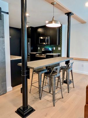 Dining room, Interior, Kitchen, Pendant Lights, Recessed Lighting, Stainless Steel Appliances, Wood Texture Flooring