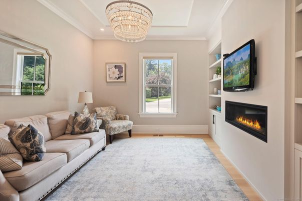 Chandelier, Fireplace, Interior, Living room, Recessed Lighting, Wood Texture Flooring