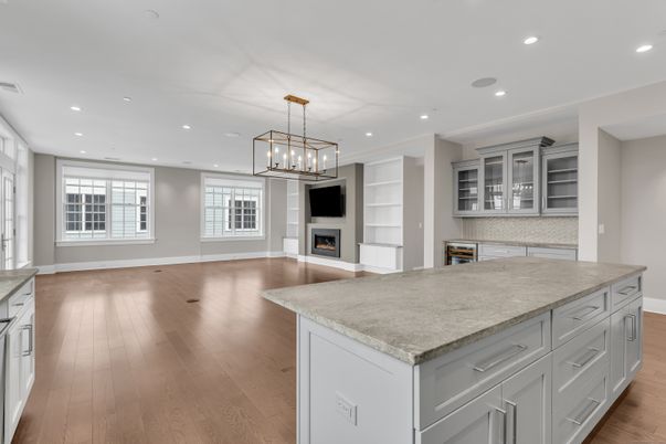 Empty room, Fireplace, Interior, Kitchen, Pendant Lights, Recessed Lighting, Wood Texture Flooring