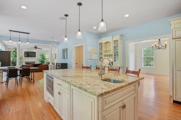 Chandelier, Dining room, Interior, Kitchen, Living room, Pendant Lights, Recessed Lighting, Wood Texture Flooring