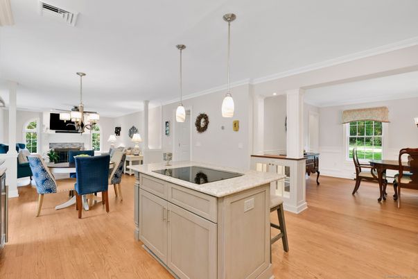 Chandelier, Dining room, Fireplace, Interior, Pendant Lights, Wood Texture Flooring