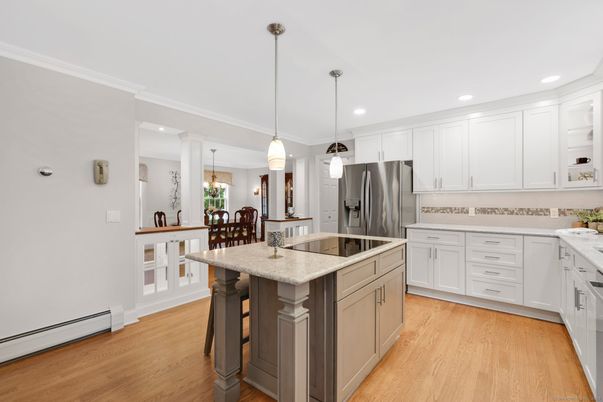 Dining room, Interior, Kitchen, Pendant Lights, Recessed Lighting, Stainless Steel Appliances, Wood Texture Flooring