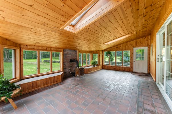 Empty room, Fireplace, Interior, Stone Walls, Sun Room, Wooden Ceilings, Wooden Walls