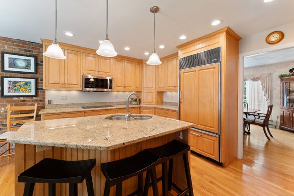 Dining room, Interior, Kitchen, Pendant Lights, Recessed Lighting, Stainless Steel Appliances, Wood Texture Flooring