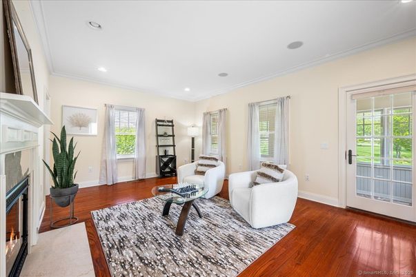 Fireplace, Interior, Living room, Recessed Lighting, Wood Texture Flooring