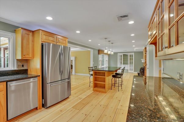 Dining room, Interior, Kitchen, Pendant Lights, Recessed Lighting, Stainless Steel Appliances, Wood Texture Flooring
